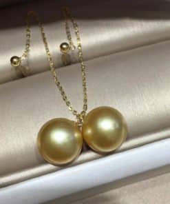 Golden pearl earring