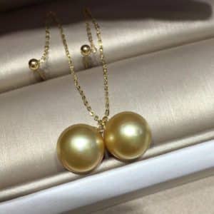 Golden pearl earring